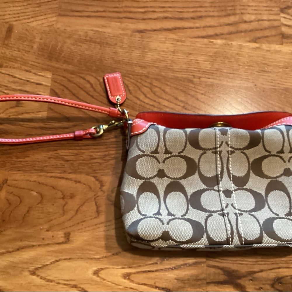 Stylish Coach Brown a coach wristlet
